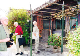 A standard siheyuan usually falls into a rectangular compound with one-story houses squarely facing the cardinal points and a courtyard in middle.